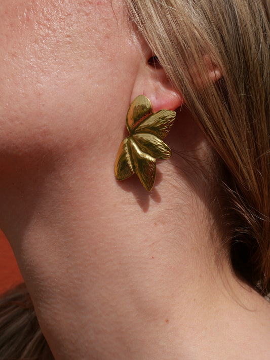 Boucles d’oreilles Fleur dorée — Acier inoxydable